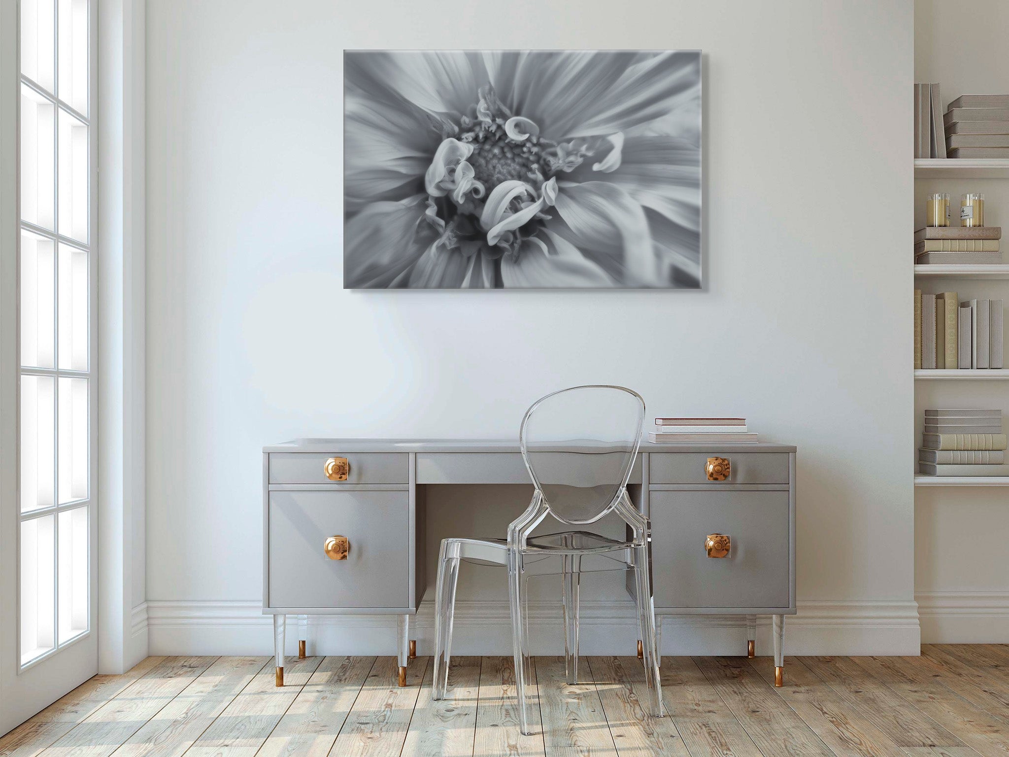 Picture hanging on the wall of an office over a desk. The picture is a black and white flower photograph of a dahlia flower titled "A Dash of Elegance" by Cameron Dreaux of Dreaux Fine Art.
