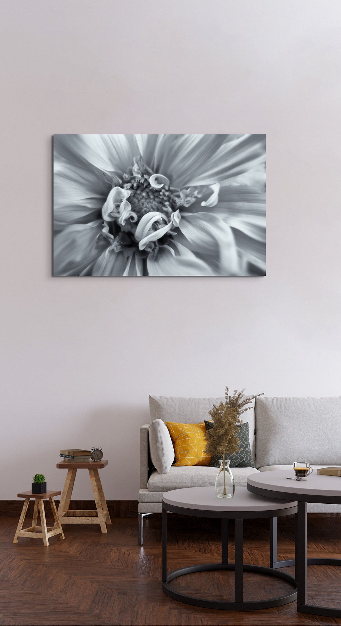 Picture hanging on the wall of a living room. The picture is a black and white flower photograph of a dahlia flower titled "A Dash of Elegance" by Cameron Dreaux of Dreaux Fine Art.