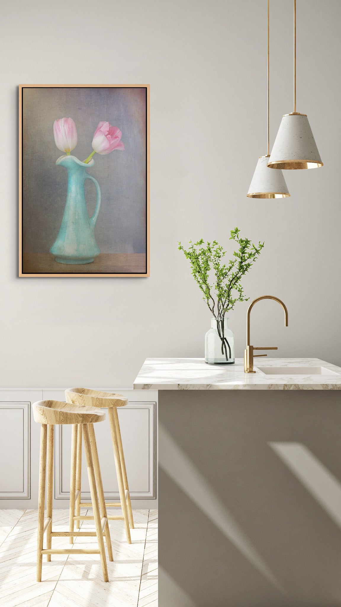 Picture hanging on the wall of a kitchen. The picture is a fine art flower photograph of two pink tulips in a vase titled "An Ambitious Pair" by Cameron Dreaux of Dreaux Fine Art.