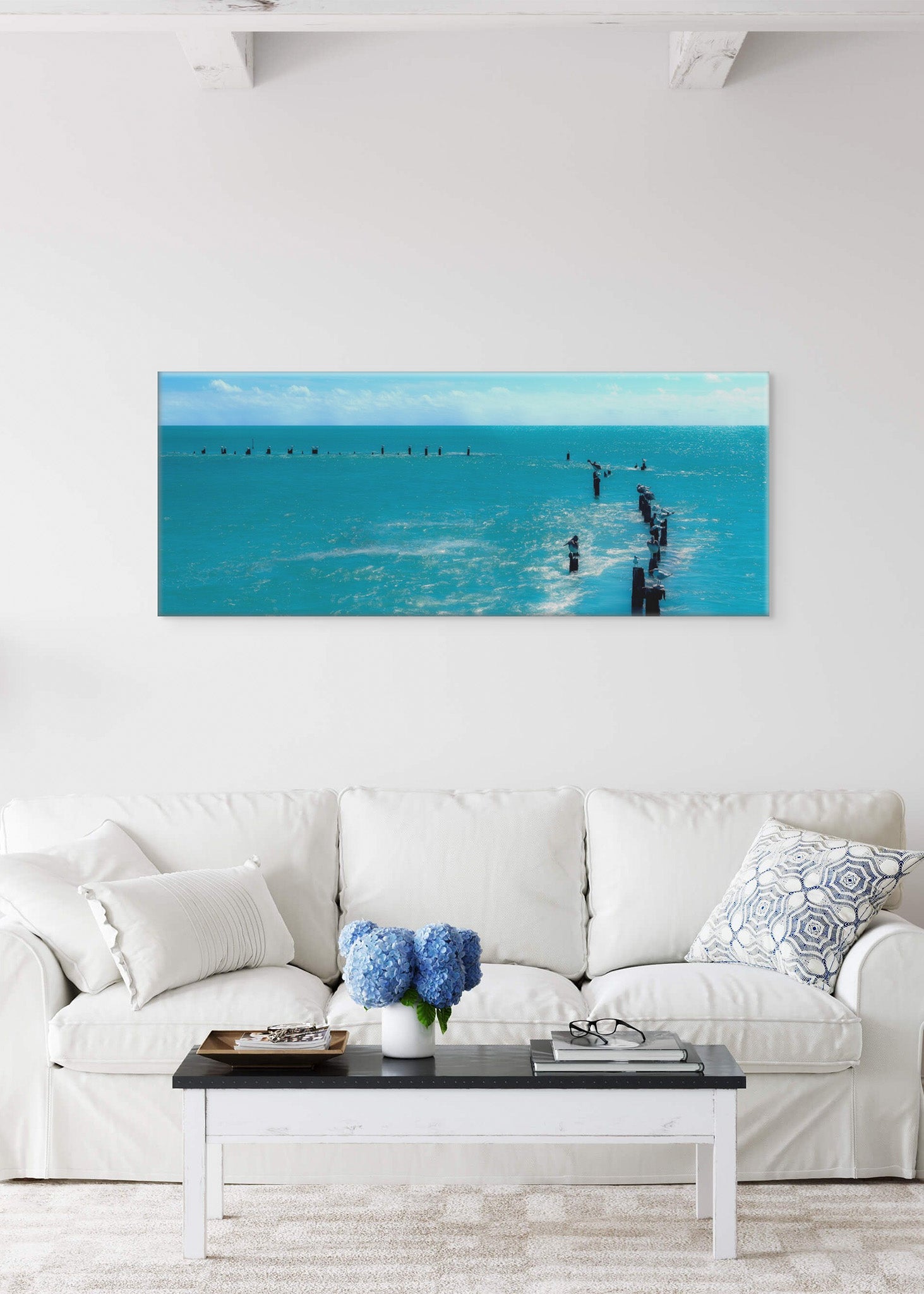 Picture hanging on the wall of a living room. The picture is a fine art landscape photograph titled "Island Time" by Cameron Dreaux of Dreaux Fine Art.