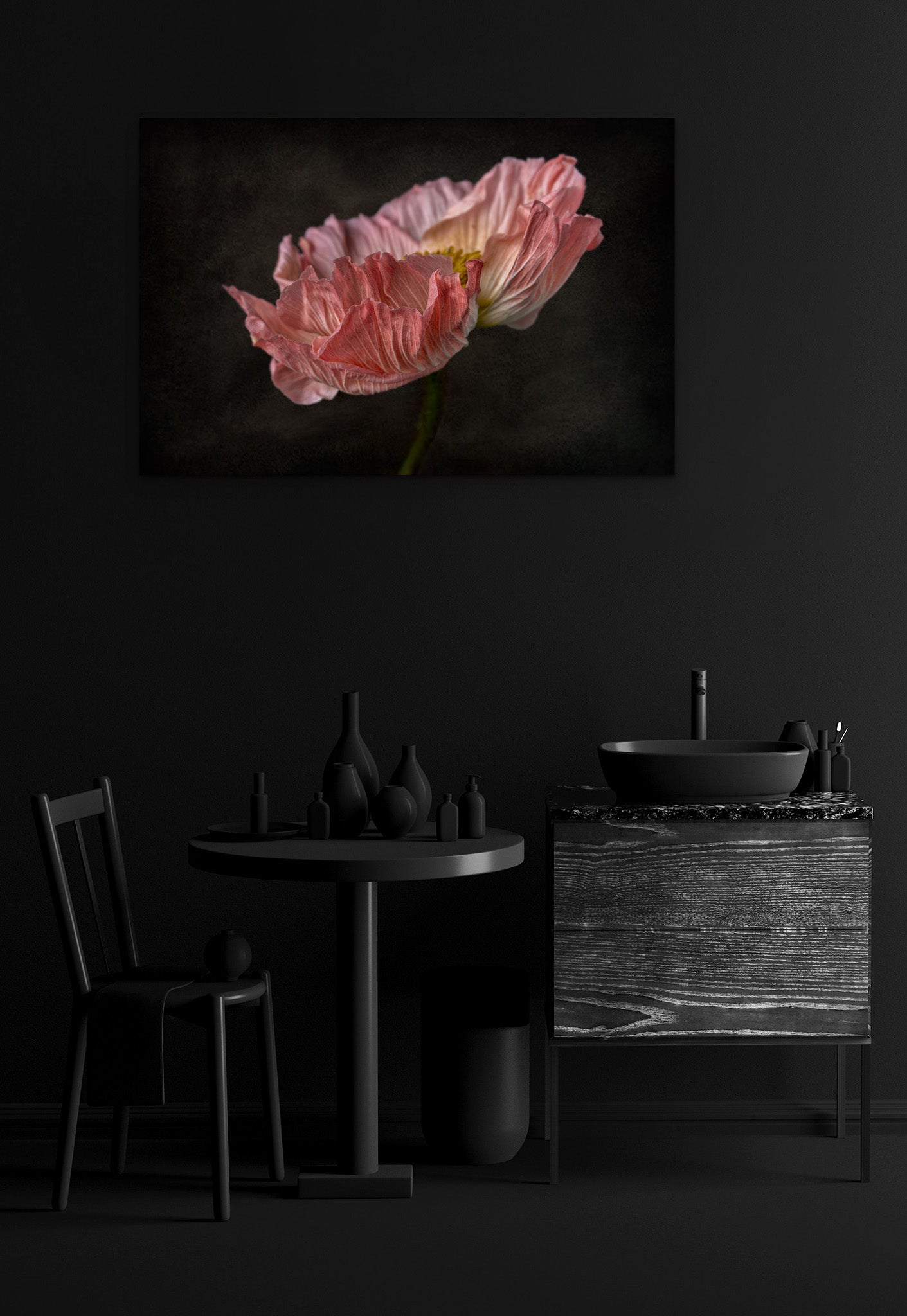 Picture hanging on the wall of an all-black room with a table and sink. The picture is a fine art flower photograph of a pink Icelandic Poppy titled "Lovely Lady" by Cameron Dreaux of Dreaux Fine Art. 