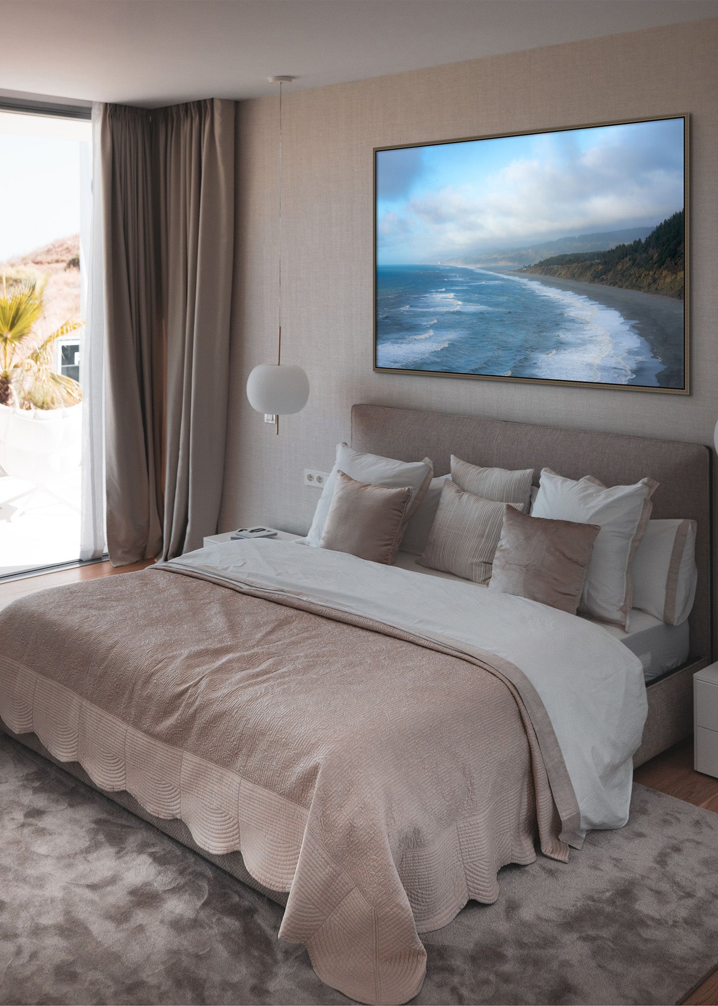 Picture hanging on the wall of a bedroom. The picture is a fine art landscape photograph titled "Coastal Tide" by Cameron Dreaux of Dreaux Fine Art.